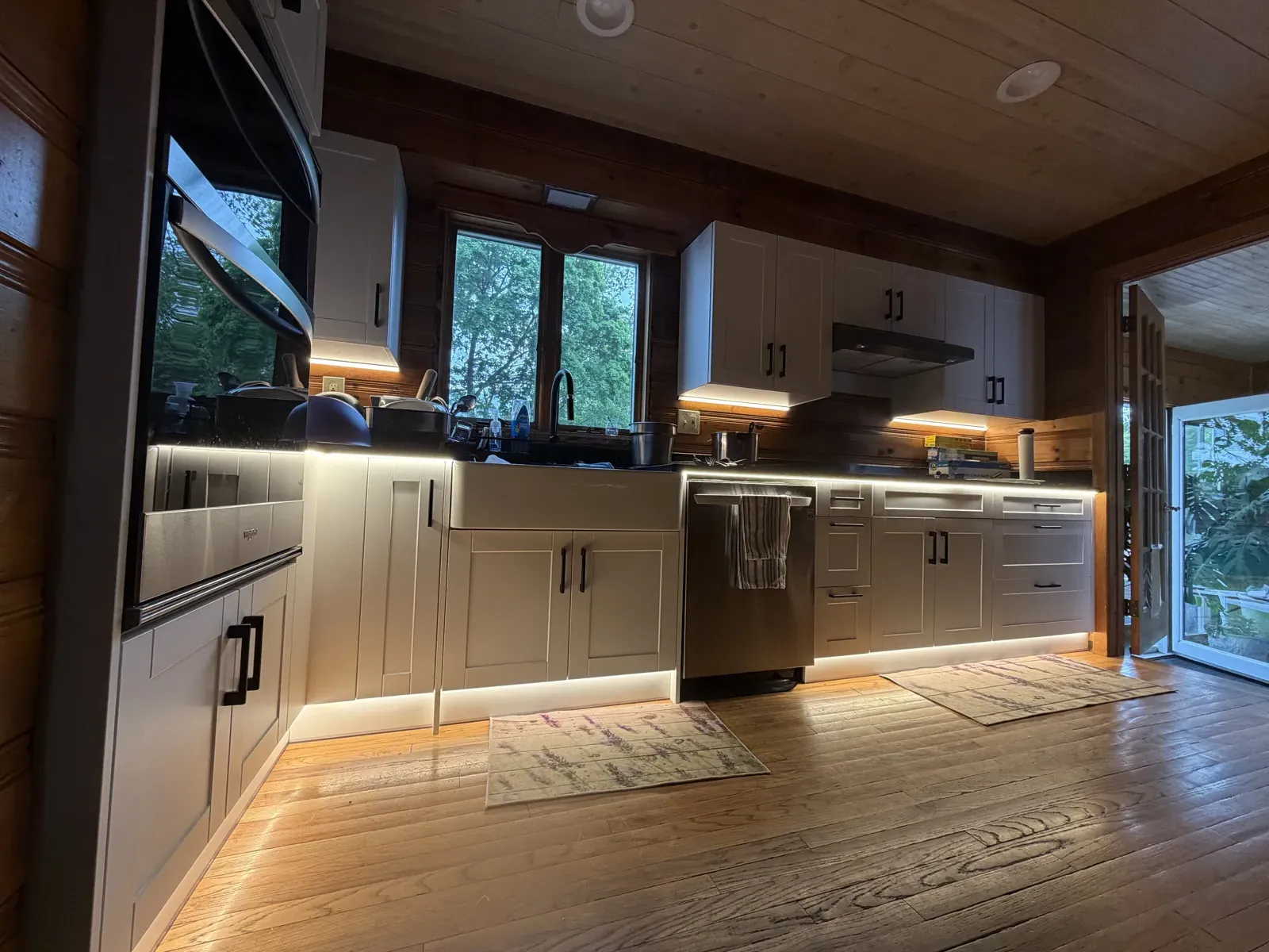 Customer kitchen with LED lighting under the upper cabinets and along the toe-kicks